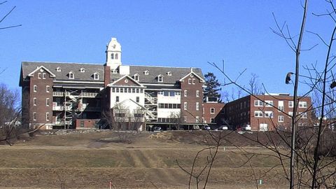 This file photo shows buildings and property of Burlington College in Burlington, Vermont. Before housing the college, the building was home to St. Joseph's Orphanage.