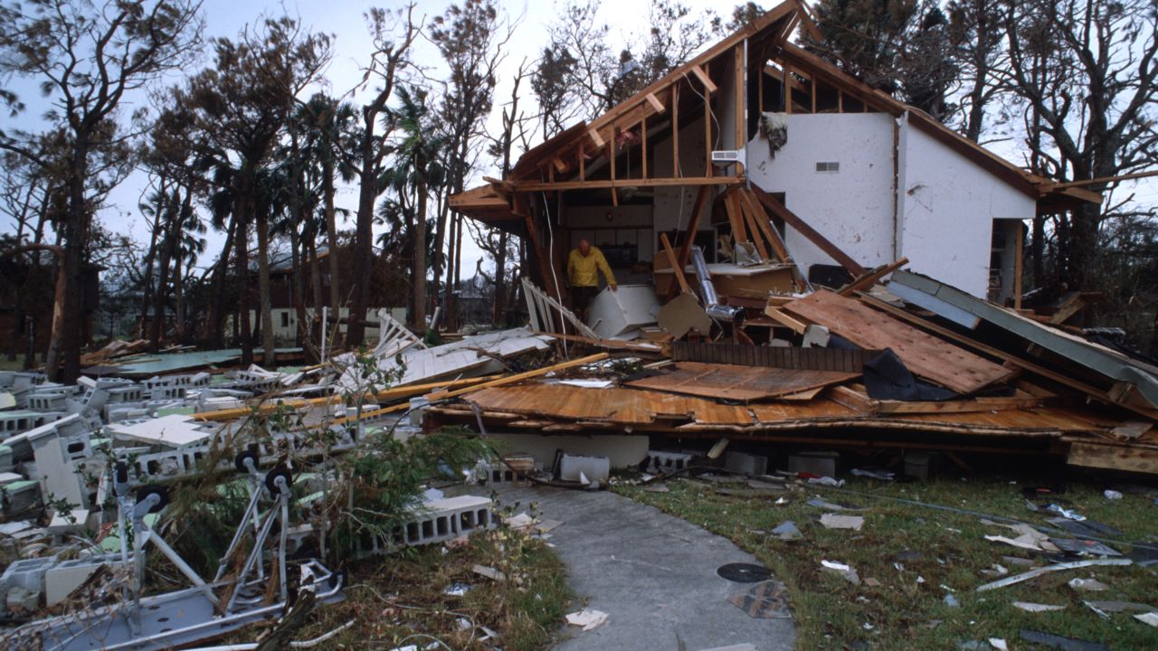 065106 02: A man stands in a partially destroyed house September 27, 1989 in South Carolina. Hugo is ranked as the eleventh most intense hurricane to strike the US this century and is rated the second costliest with over seven billion dollars in damages. (Photo by Alan Weiner/Liaison)