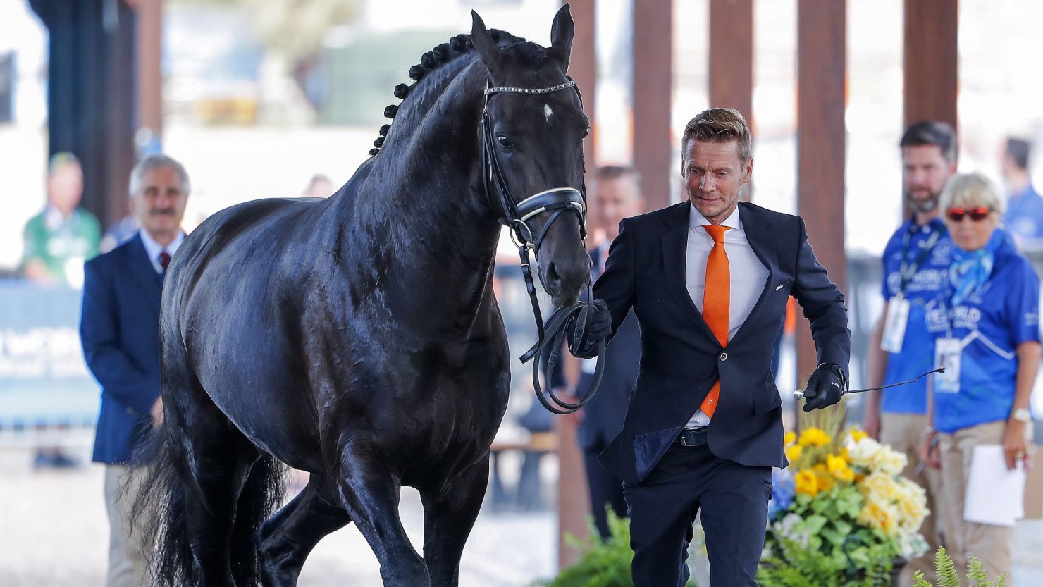 Dressage rider Edward Gal and his horse Glock's Zonik N.O.P. of the Netherlands participate in inspection on Tuesday. 