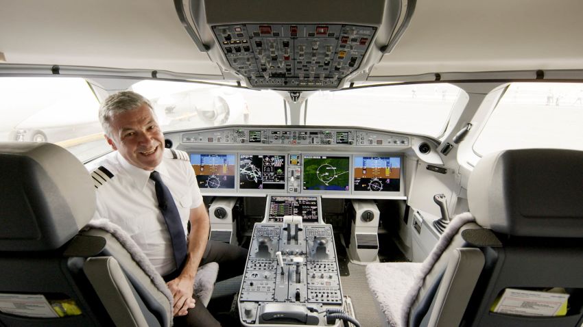 airBaltic chief pilot Gerhard Ramcke in the cockpit of an Airbus A220-300