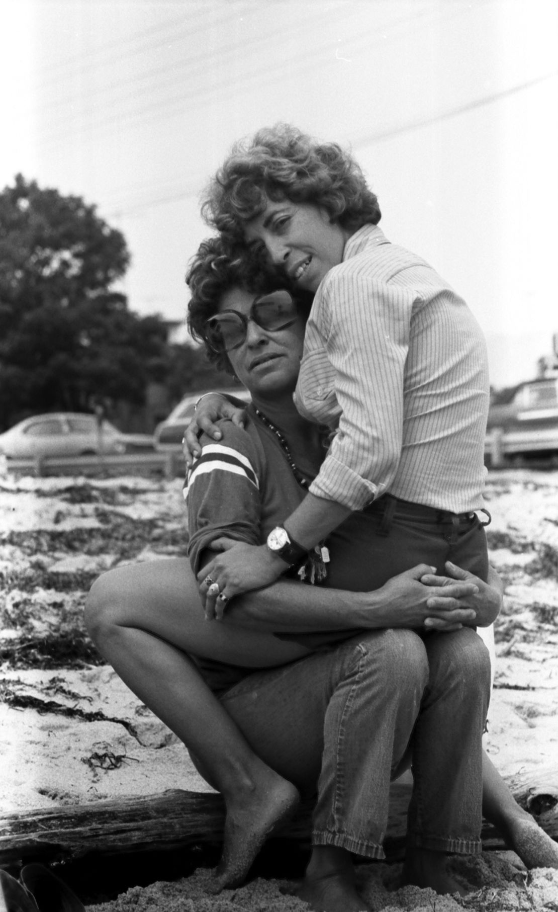 "Helaine on her girlfriend's lap, Provincetown" (1974)
