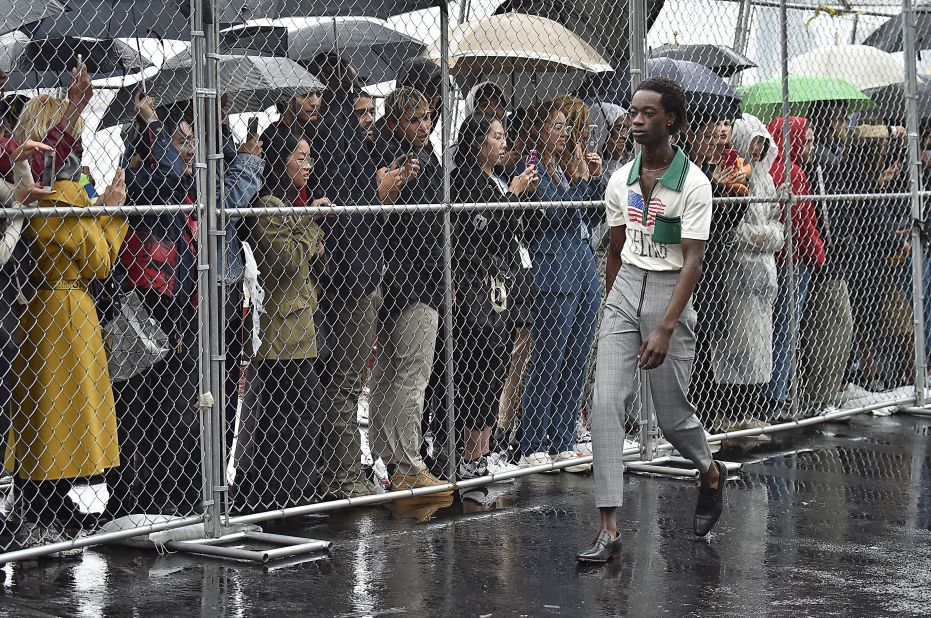 At Telfar's show, held on a helipad near the East River, performers roamed freely around a drum set, while audiences watched behind a chain-link fence. 