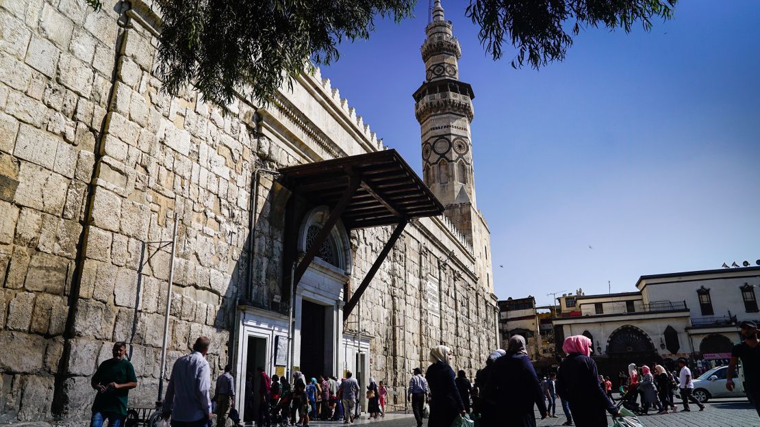 A crowd gathers outside Umayyad mosque -- Islam's fourth holiest site -- in Damascus's old city. 