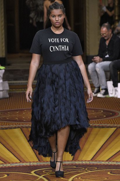 Christian Siriano presented a shirt that read "Vote For Cynthia," referring to New York's gubernatorial candidate, Cynthia Nixon, who was seated on the front row (and who was today <a href="https://www.cnn.com/2018/09/13/politics/new-york-democratic-primaries-progressives-establishment/index.html">defeated</a> in the Democratic primary, despite Siriano's best efforts).