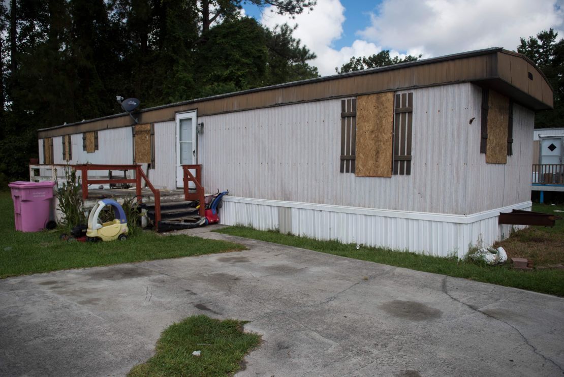 The windows of a mobile home in Wilmington, North Carolina, were boarded up by a family that evacuated Wednesday.
