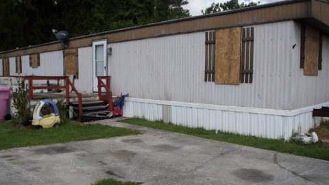 The windows of a mobile home in Wilmington, North Carolina, were boarded up by a family that evacuated Wednesday.
