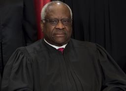 US Supreme Court Associate Justice Clarence Thomas sits for an official photo.