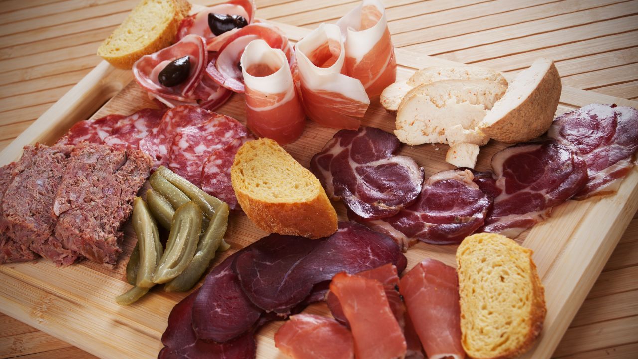 <strong>Uruguay:</strong> Pair your glass of wine with a picada plate of meats and cheese, including some Uruguayan favorites like danbo (an Edam-like cheese) and magro.