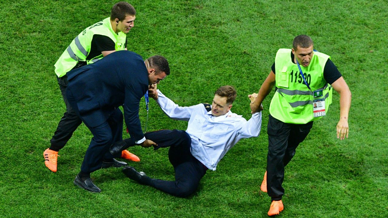 Verzilov is removed from the field of play after protesting at the 2018 World Cup Finals in Moscow.