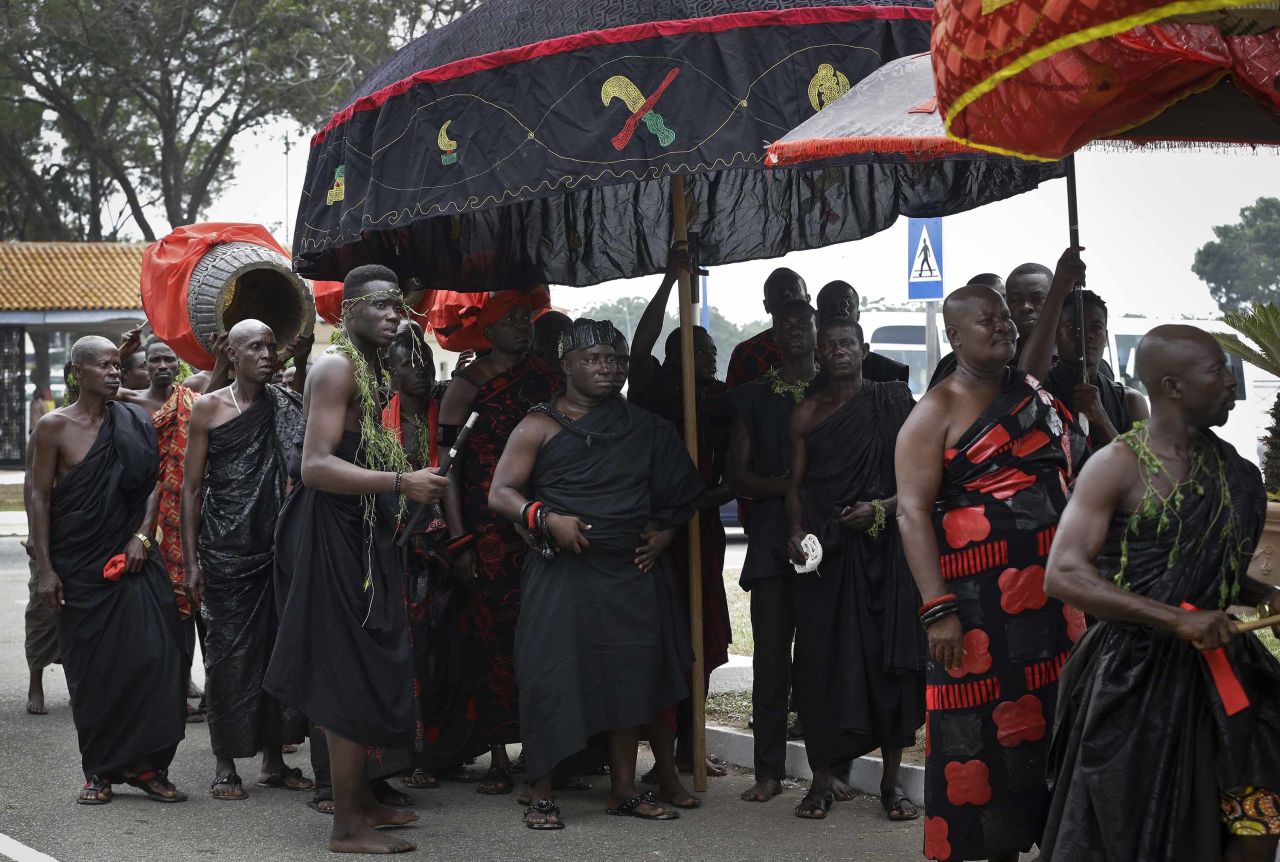 Ghanaian chiefs line up outside the conference center in Ghana's capital to pay their respects September 12.