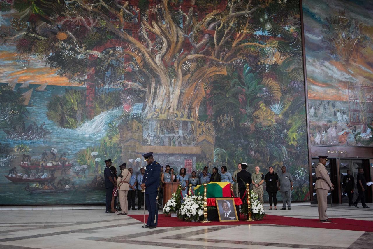 Local chiefs, politicians and extended family members wait to pay their respects to "Africa's foremost son" on September 12.