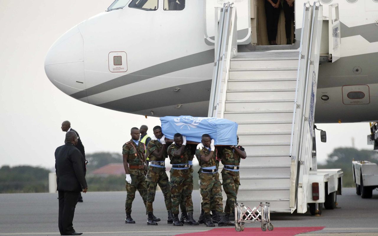 UN soldiers carry Annan's coffin after arriving at the Kotoka International Airport in Accra, Ghana, on Monday, September 10. Annan's body received a hero's welcome ahead of this week's state funeral.