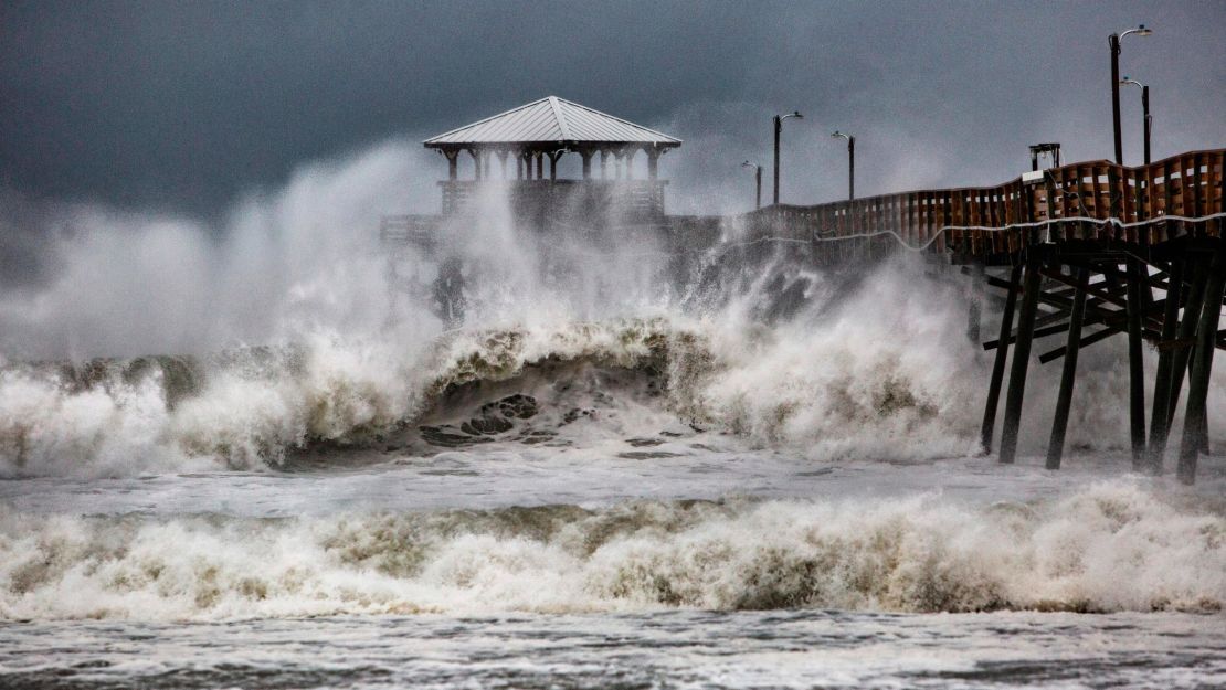 Waves crash around Oceanana Pier in Atlantic Beach, North Carolina, as the outer bands of Hurricane Florence begin to affect the coast on Thursday, September 13.