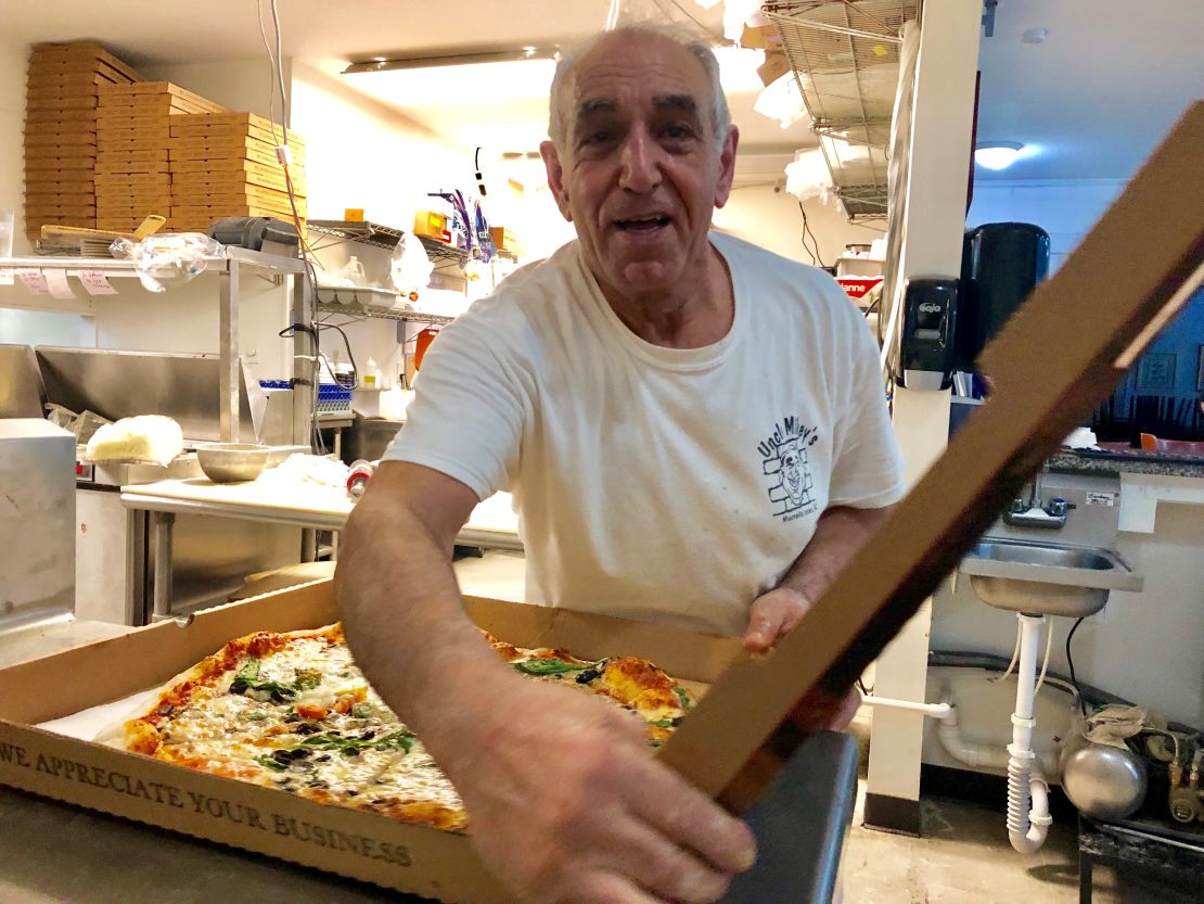 Mikey Zalloum makes pizza Thursday night at his Myrtle Beach, South Carolina, restaurant.