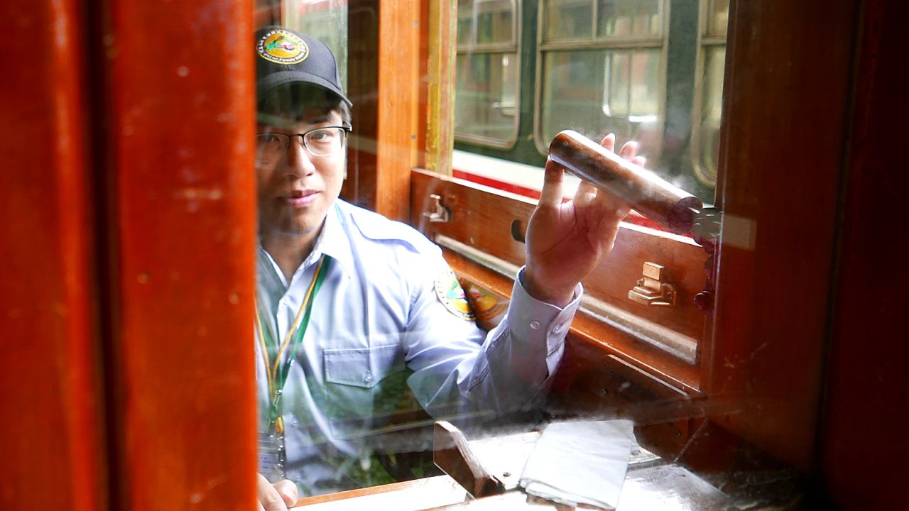 Alishan Forest Railway train captain Liao Yuan-chao.
