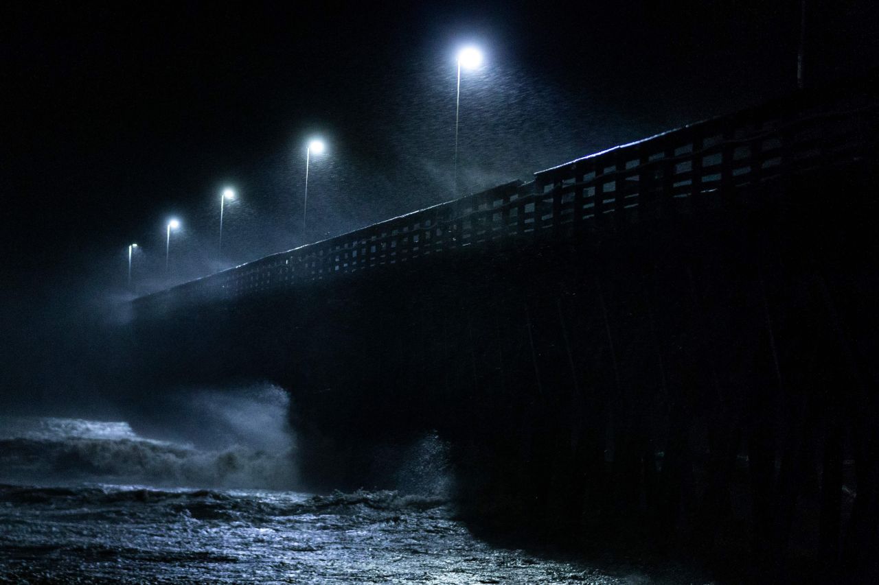 Waves crash into the Second Avenue Pier in Myrtle Beach on September 14.