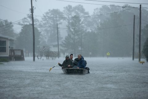 Volunteers help rescue people from their flooded homes in New Bern on September 14. 