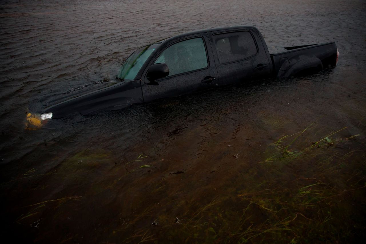 A truck is submerged in floodwaters in Jacksonville, North Carolina, on Saturday.