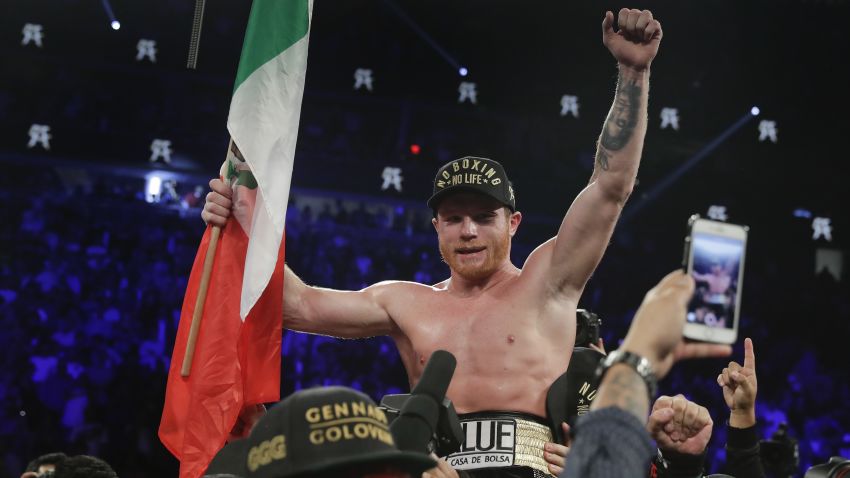Canelo Alvarez celebrates after defeating Gennady Golovkin by majority decision in a middleweight title boxing match, Saturday, Sept. 15, 2018, in Las Vegas. (AP Photo/Isaac Brekken)