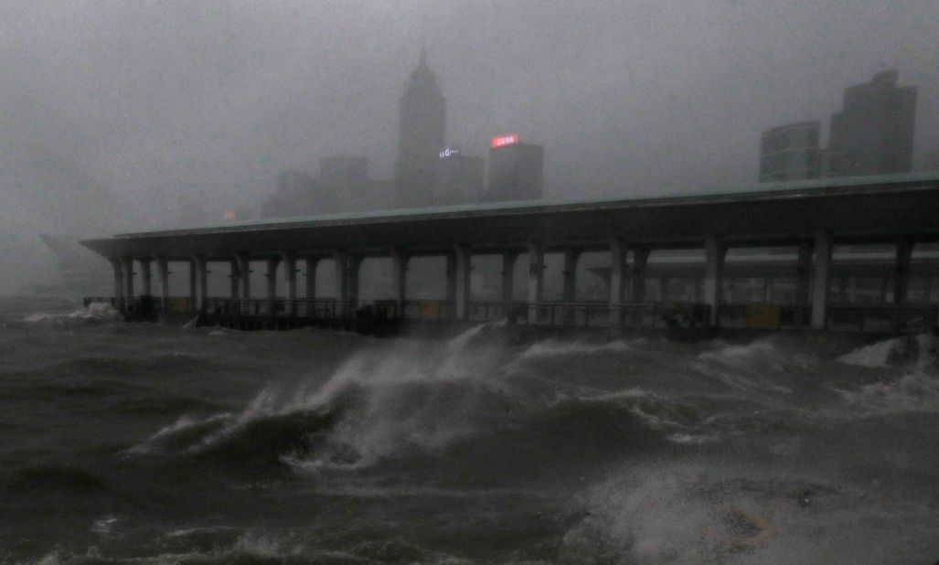 Strong winds churn waves on Hong Kong's Victoria Harbor.