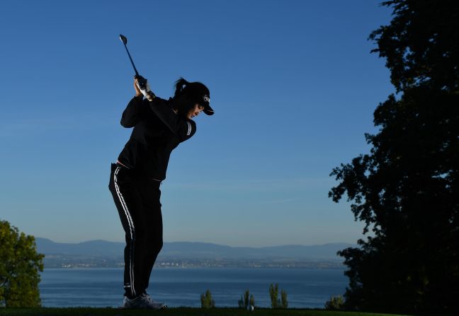 Some of the tees boast incredible views across Lake Geneva and the French Alps. Pictured is the second hole where South Korea's So-yeon Ryu is seen taking a shot.