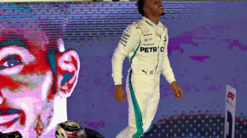 Lewis Hamilton celebrates after his brilliant victory in the Singapore Grand Prix.