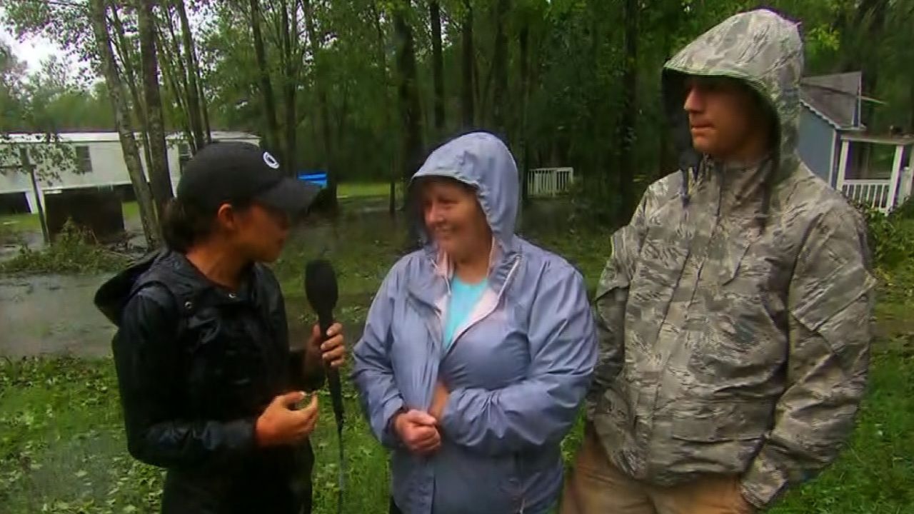 Susan Bostic and her grandson Tyler evacuate her home in Rocky Point, NC. 