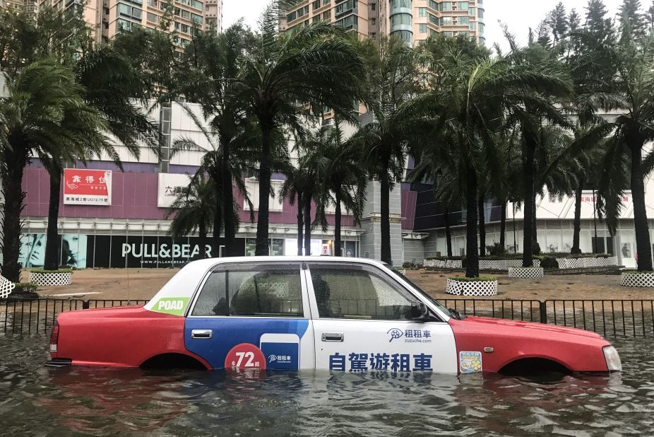 A taxi is left abandoned after breaking down in Hong Kong.