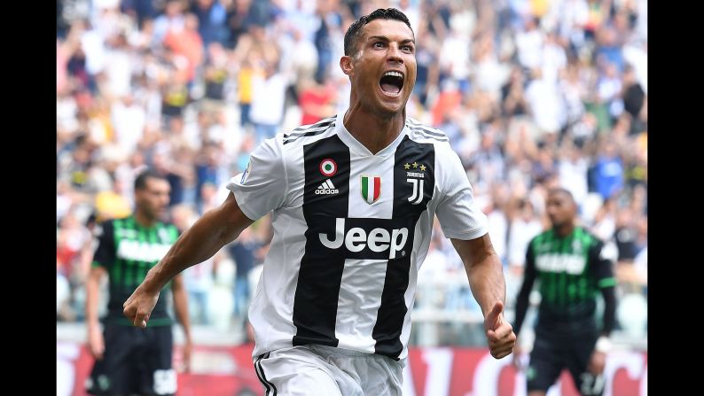 Juventus' Cristiano Ronaldo celebrates after scoring during a Series A soccer match between Juventus and Sassuolo, at the Allianz Stadium in Turin, Italy, on Sunday, September 16.
