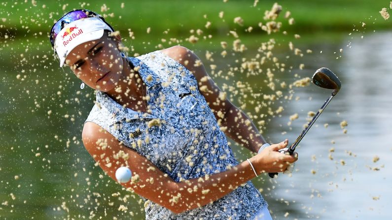 Lexi Thompson of The United States plays a shot out of the bunker during day two of the Evian Championship in Evian-les-Bains, France, on Friday, September 14.