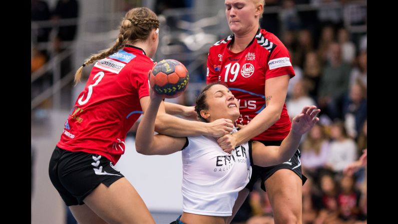 Heid's Sara Larsson Fridman and Elin Svensson stop Boden's Julie Soulard during a handball match in Gothenburg, Sweden on Thursday, September 13.