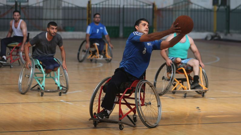 Disabled Palestinians take part in a local wheelchair basketball championship game in Gaza City on Thursday, September 13.