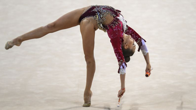 Arina Averina of Russia competes using the clubs during the final at the 36th FIG Rhythmic Gymnastics World Championships at Armeec arena in Sofia, Bulgaria, on Thursday, September 13.