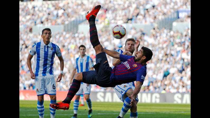 Barcelona's Luis Suarez shoots at goal during the match between Real Sociedad and FC Barcelona in San Sebastián, Spain, on Saturday, September 15.