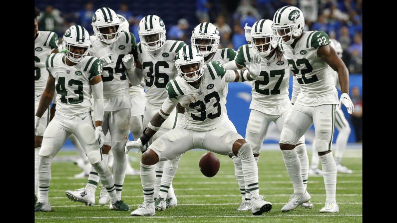 New York Jets defensive back Jamal Adams celebrates his interception with teammates during the second half of the game against the Detroit Lions in Detroit on Monday, September 10.