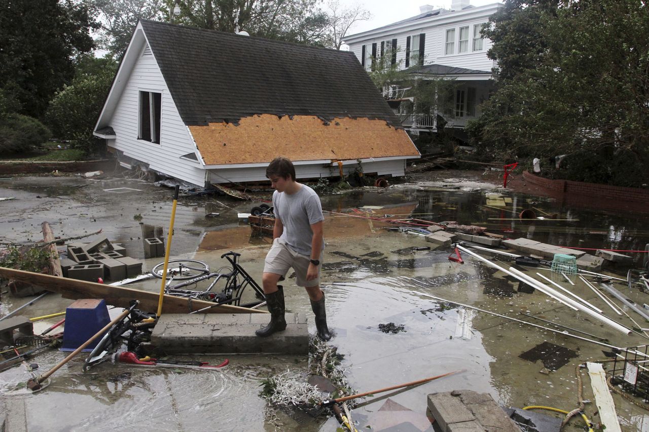 Joseph Eudi surveys debris and storm damage at a home in New Bern, North Carolina, on September 15.