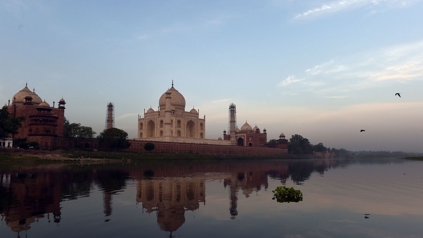 The Taj Mahal relection is seen on Yamuna river in Agra on April 16, 2016.
Britain's Prince William, Duke of Cambridge and Catherine, Duchess of Cambridge are schedule to visit Taj Mahal later in the day, during the last leg of their India-Bhutan visit. / AFP / Prakash SINGH        (Photo credit should read PRAKASH SINGH/AFP/Getty Images)