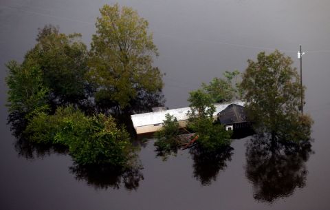 Floodwaters surround a trailer in Pollocksville, North Carolina, on September 17.