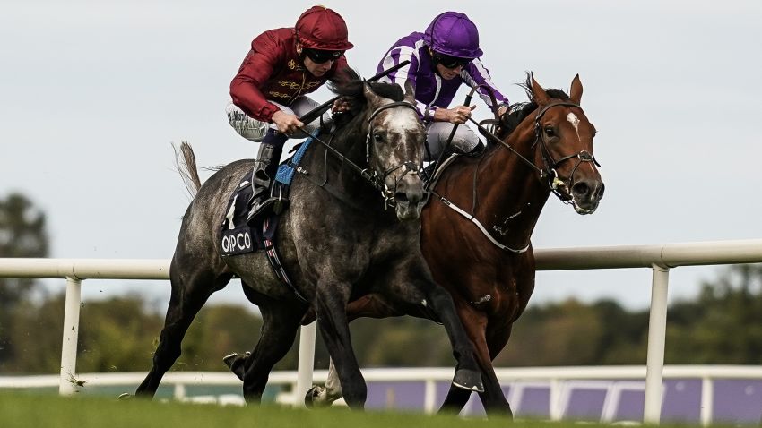 DUBLIN, IRELAND - SEPTEMBER 15:  Oisin Murphy riding Roaring LIon (L, red) win The QIPCO Irish Champion Stakes from Ryan Moore and Saxon Warrior (R) at Leopardstown Racecourse on September 15, 2018 in Dublin, Ireland. (Photo by Alan Crowhurst/Getty Images)