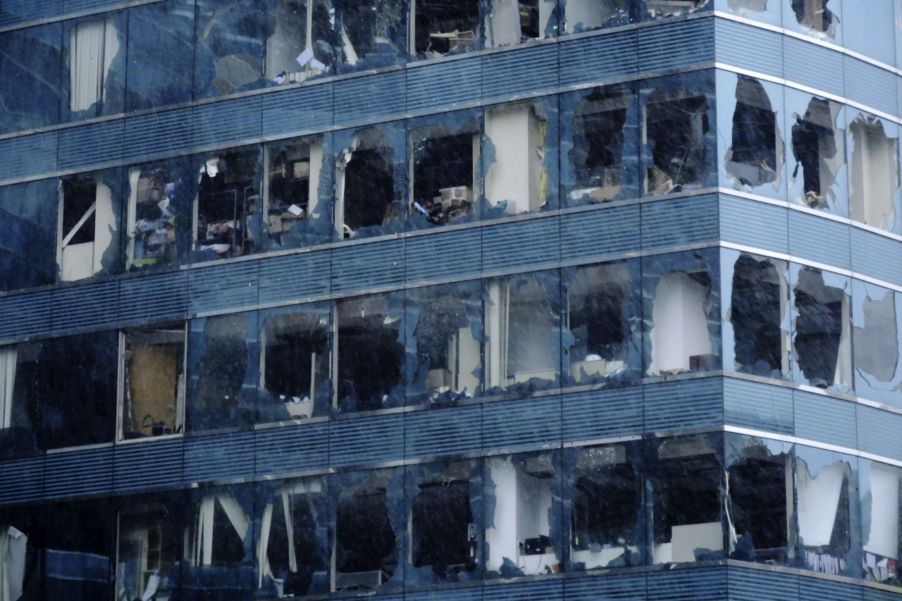 In this Sunday, Sept. 16, 2018, photo released by Xinhua News Agency, an office building's windows damaged by Typhoon Mangkhut in Hong Kong. (Wang Shen/Xinhua via AP)