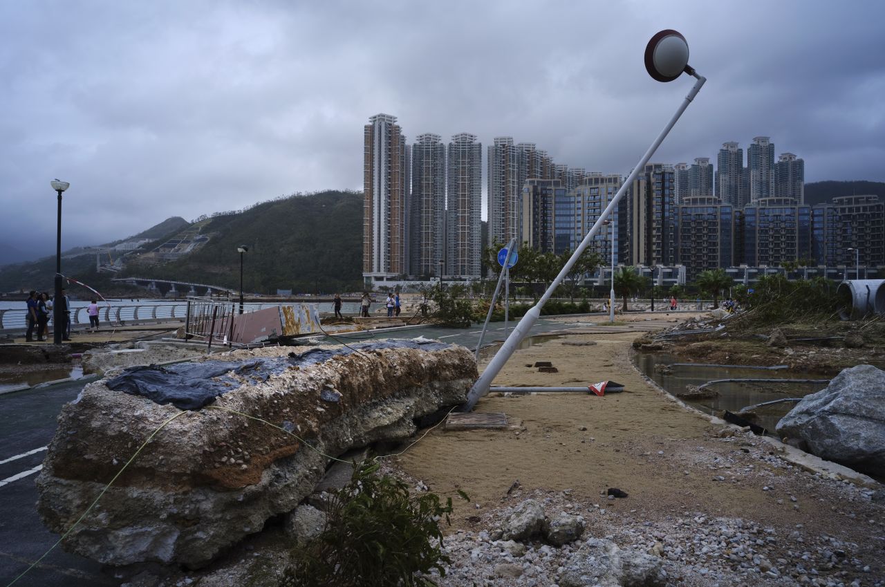 Debris caused by Typhoon Mangkhut is seen outside a housing estate on the waterfront in Hong Kong, Monday, Sept. 17, 2018. (AP Photo/Vincent Yu)