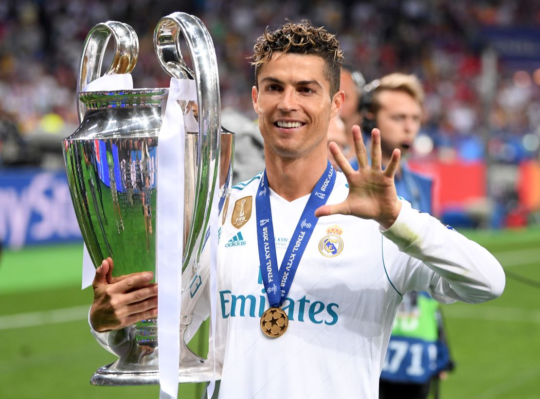 Cristiano Ronaldo celebrates his fifth Champions League trophy after beating Liverpool last season.