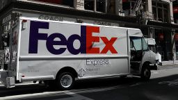 A FedEx delivery truck drives down a street on June 21, 2016 in San Francisco, California. FedEx Corp. is will announce its fourth-quarter earnings today after the closing bell. Justin Sullivan/Getty Images 