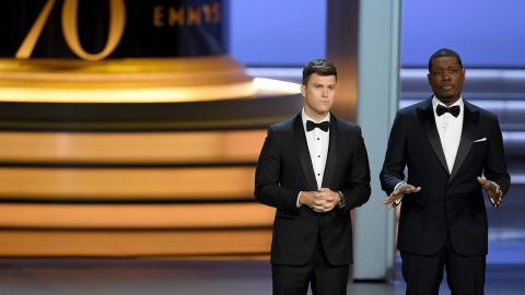 Colin Jost and Michael Che speak onstage during the 70th Emmy Awards at Microsoft Theater on September 17, 2018 in Los Angeles, California. (Photo by Kevin Winter/Getty Images)