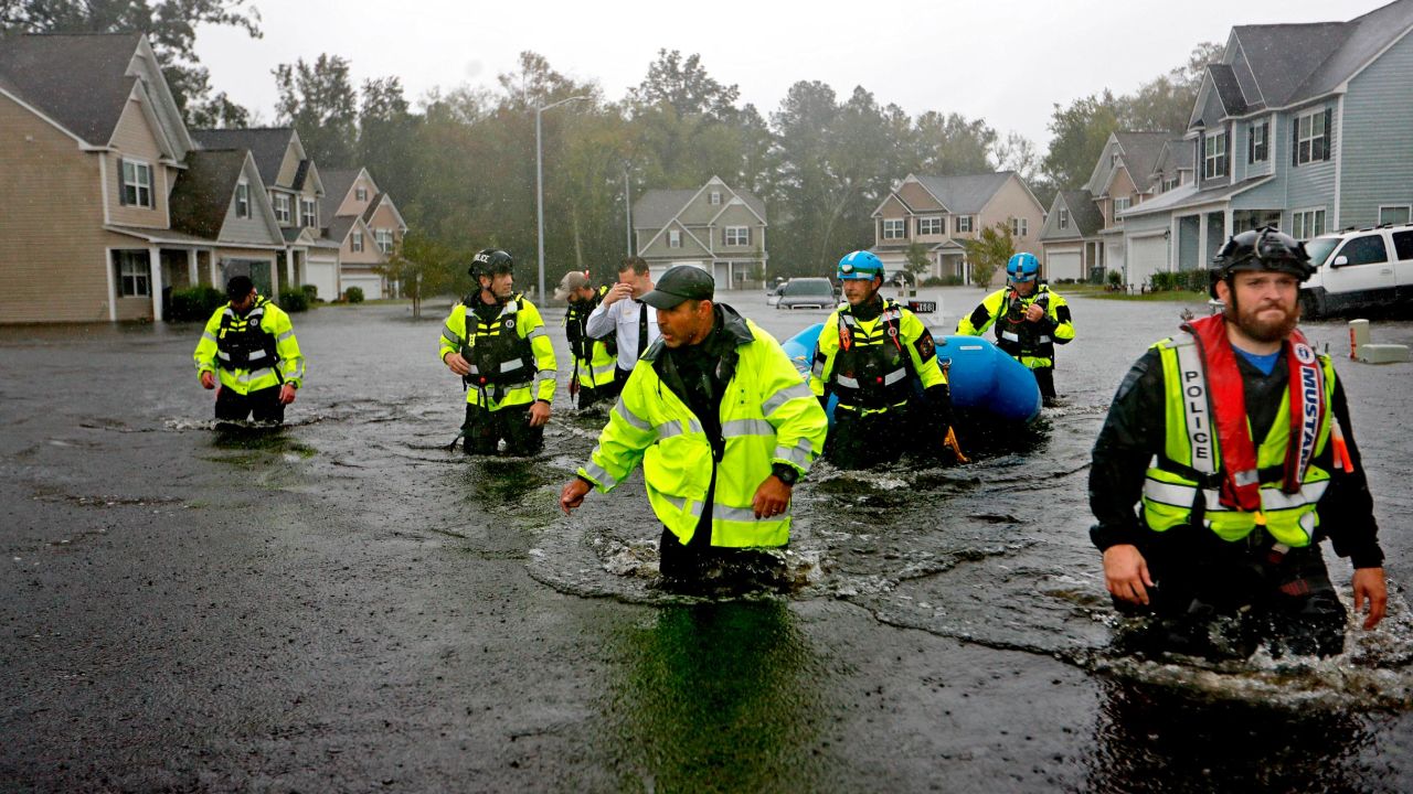 North Carolina Task Force members search for residents Sunday in Fayetteville, North Carolina.