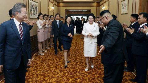 Kim and his wife, Ri Sol Ju, second from left, escort the South Korean leader and his wife, Kim Jung-sook, second from right, at the Paekwawon Guesthouse in Pyongyang on September 18.