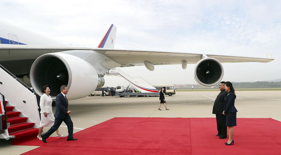 South Korean President Moon Jae-in, second from left, and his wife Kim Jung-sook, left, are greeted by Kim Jong Un and his wife, Ri Sol Ju.