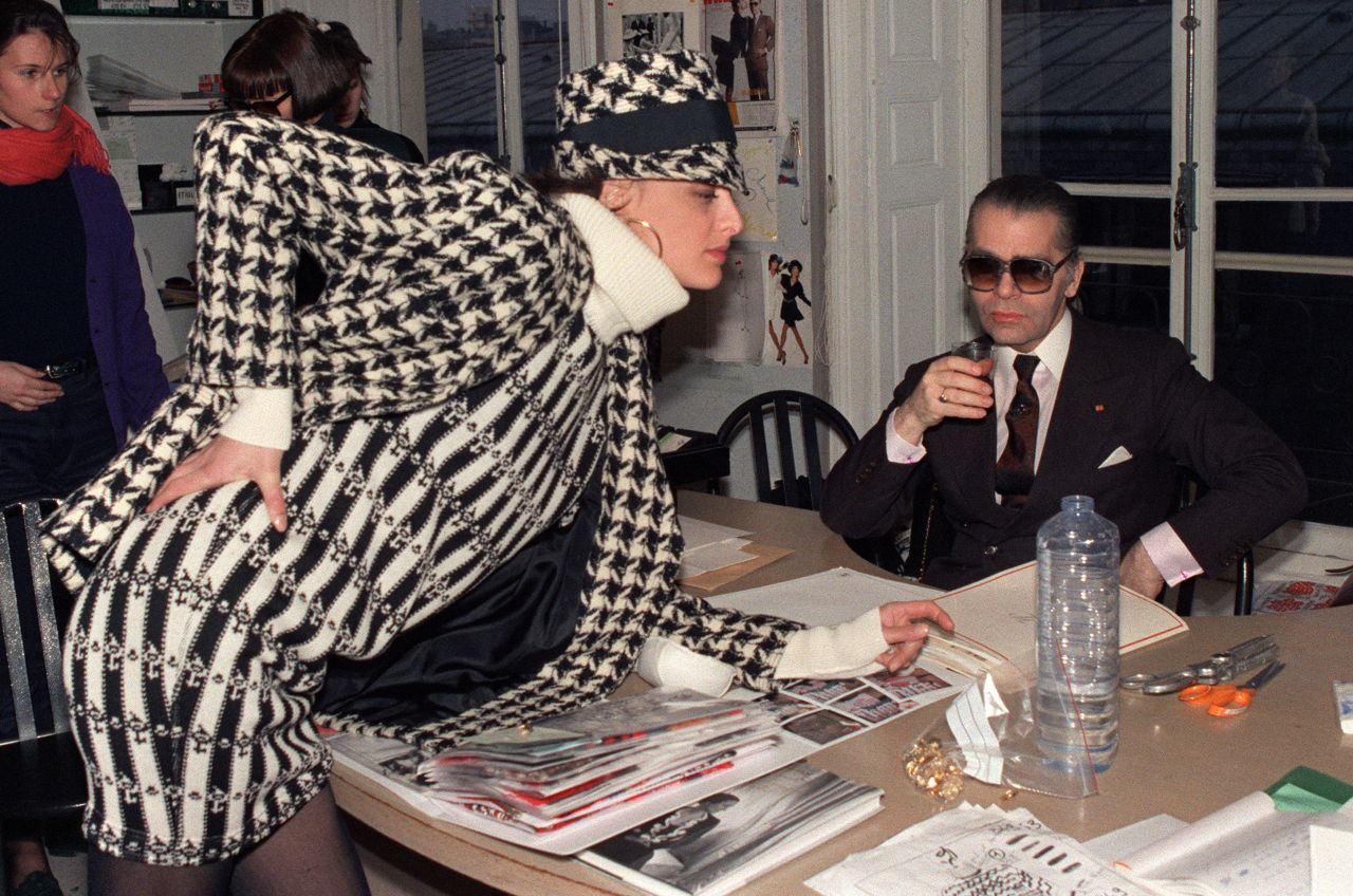 Lagerfeld with French model Inès de la Fressange ahead of the Chanel's Autumn-Winter 1987 show.