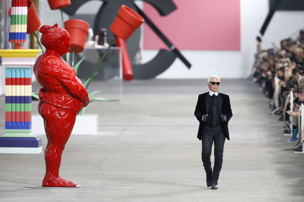 Lagerfeld walks the Chanel runway after the brand's Spring-Summer 2014 show.