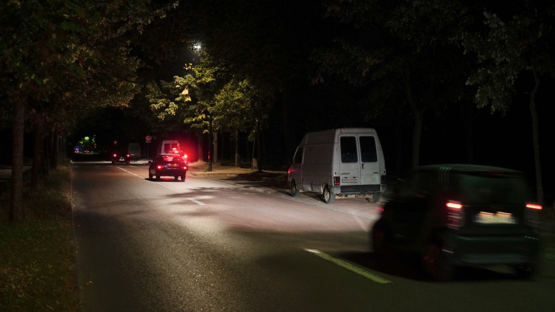 By night, prostitutes work from vans parked at the roadside in the park.